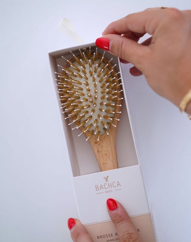 Boar bristle brush for gentle detangling and shiny hair